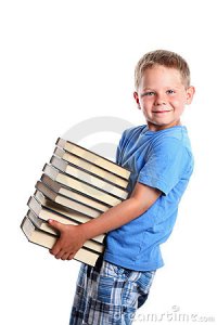 happy-child-carrying-books-10431144